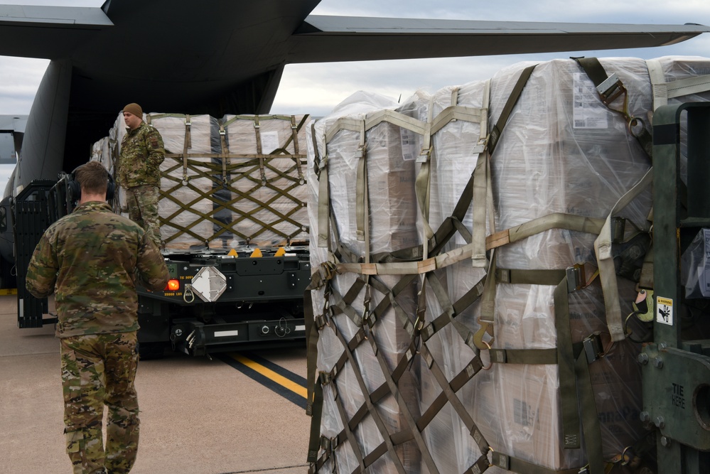 Dyess Airmen Load Humanitarian Cargo