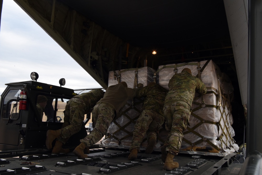 Dyess Airmen Load Humanitarian Cargo