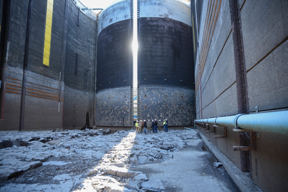 US Army Corps of Engineer Officials at the bottom of the Navigation Lock at McNary Dam.