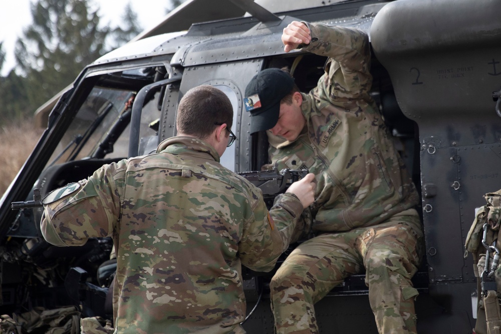 U.S. Army Soldiers prepare an M240H