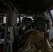 CW2 Ryan Zent observes Cpt. J ared Miller firing an M240H from a UH-60 Blackhawk at Grafenwoehr Training Area, Germany on March 16, 2022