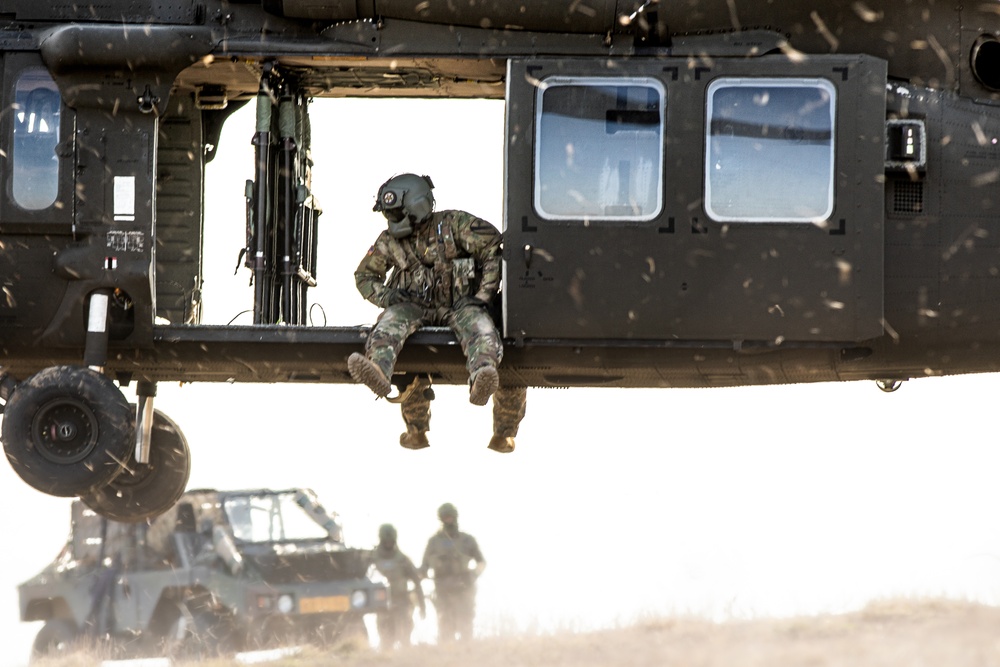 3rd Battalion, 227th Aviation Regiment conducts sling load and air assault operations with the Royal Netherlands 11th Infantry Brigade during Rapid Falcon 2022