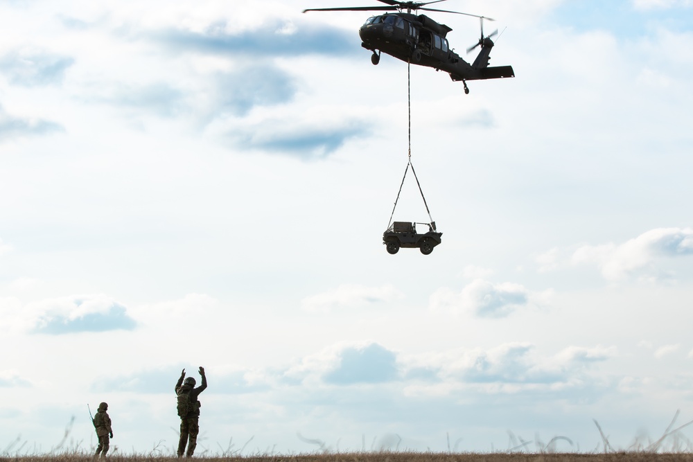 3rd Battalion, 227th Aviation Regiment conducts sling load and air assault operations with the Royal Netherlands 11th Infantry Brigade during Rapid Falcon 2022