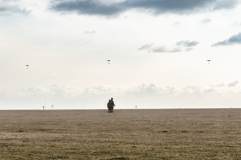 3rd Battalion, 227th Aviation Regiment conducts sling load and air assault operations with the Royal Netherlands 11th Infantry Brigade during Rapid Falcon 2022