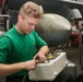 Abraham Lincoln Sailors conduct aircraft maintenance