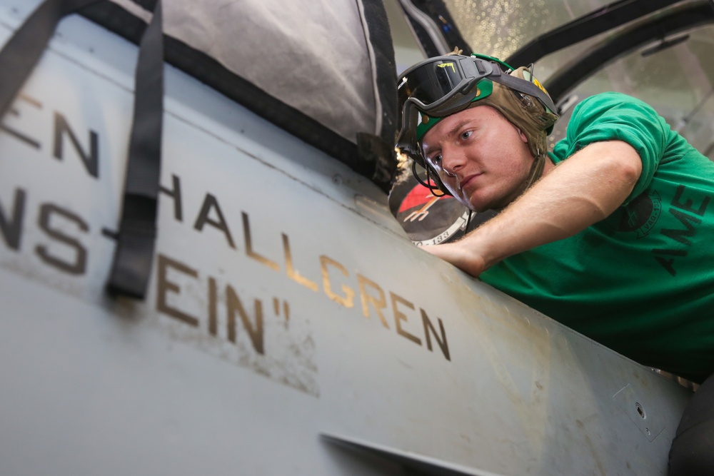 Abraham Lincoln Sailors conduct aircraft maintenance