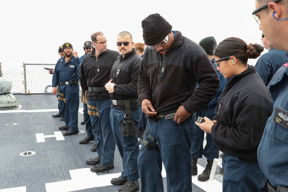 USS Ross Sailors conduct small arms shoot