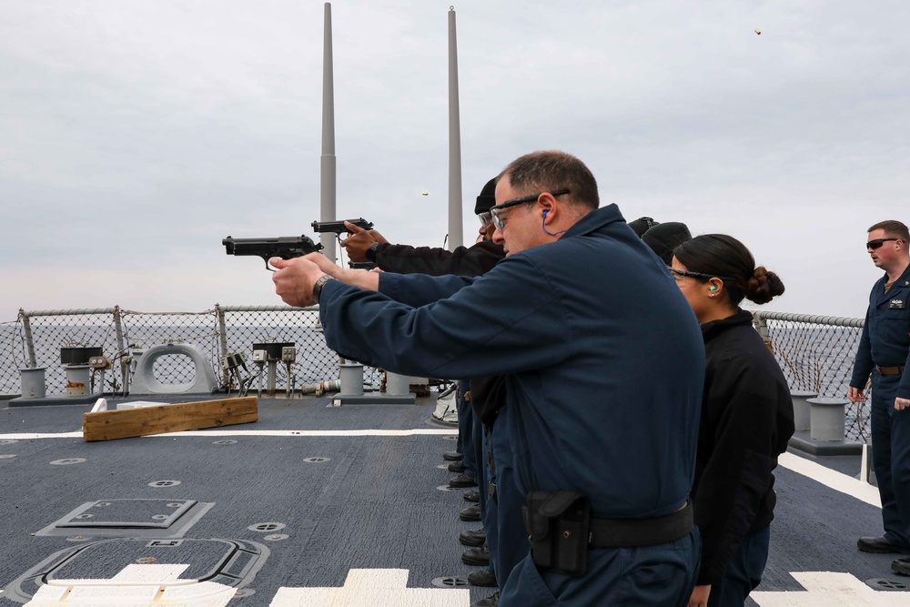 USS Ross Sailors conduct small arms shoot