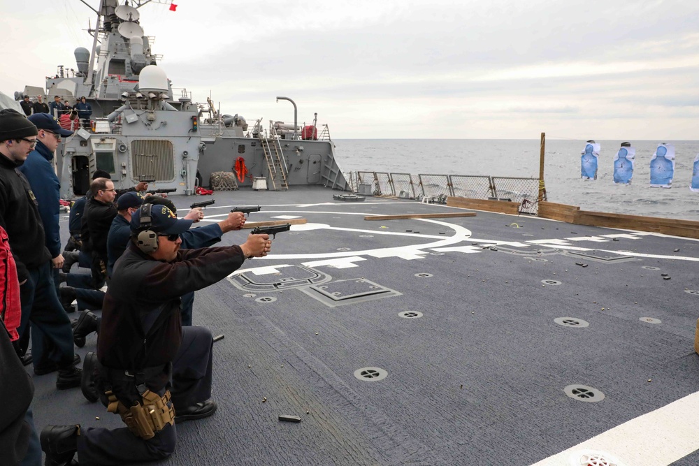USS Ross Sailors conduct small arms shoot