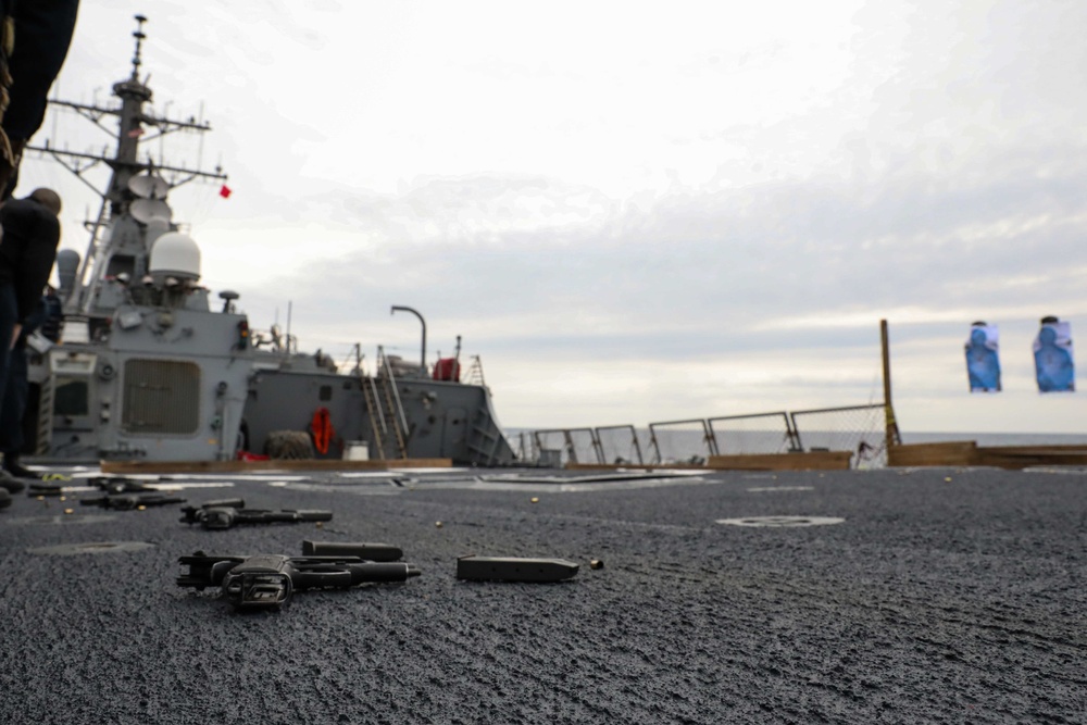 USS Ross Sailors conduct small arms shoot