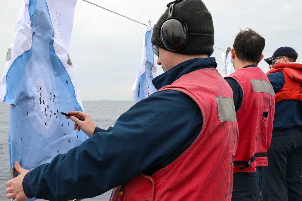USS Ross Sailors conduct small arms shoot