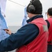 USS Ross Sailors conduct small arms shoot