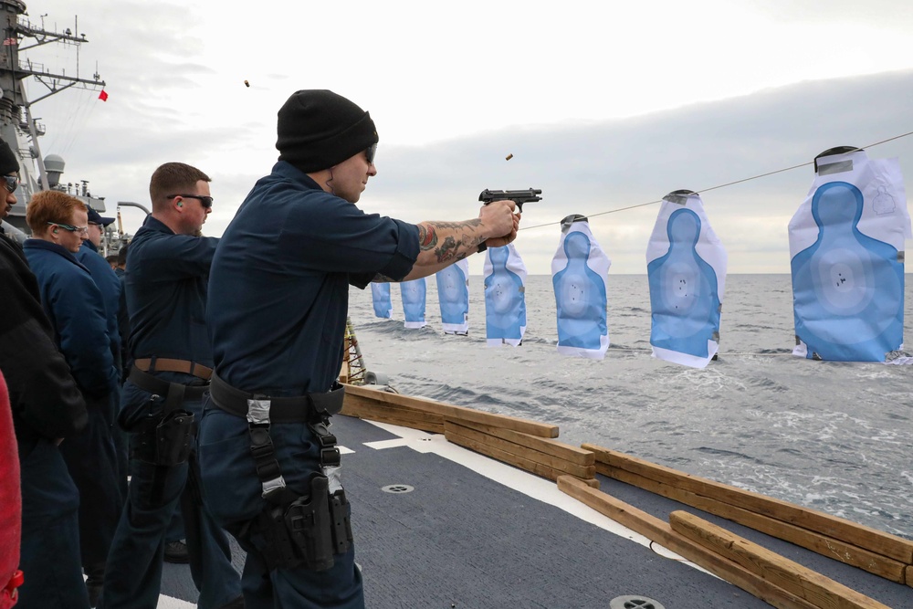 USS Ross Sailors conduct small arms shoot