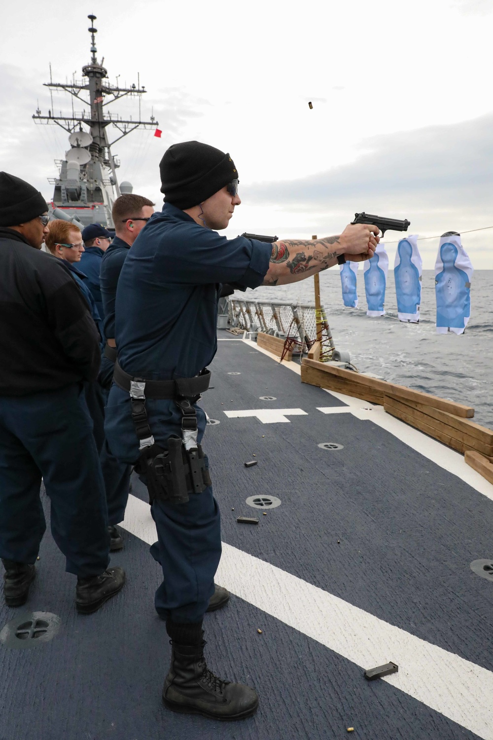 USS Ross Sailors conduct small arms shoot