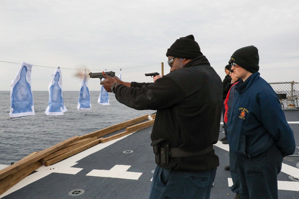 USS Ross Sailors conduct small arms shoot