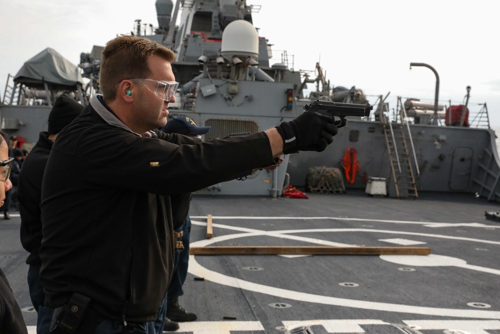 USS Ross Sailors conduct small arms shoot