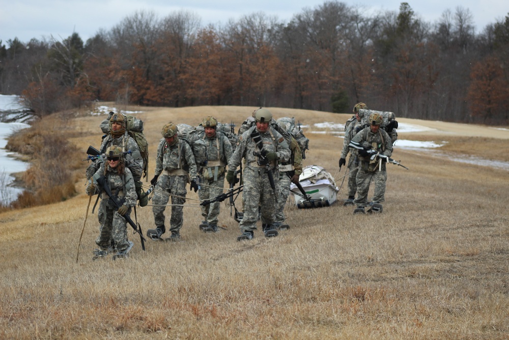 Fort McCoy Cold-Weather Operations Course students practice ahkio sled use