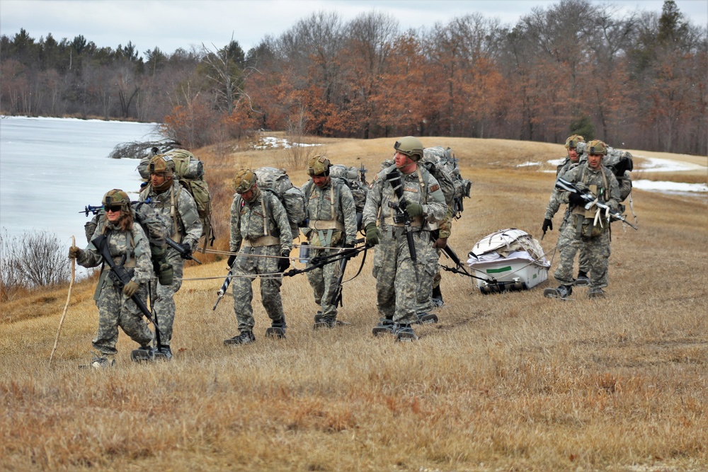 Fort McCoy Cold-Weather Operations Course students practice ahkio sled use