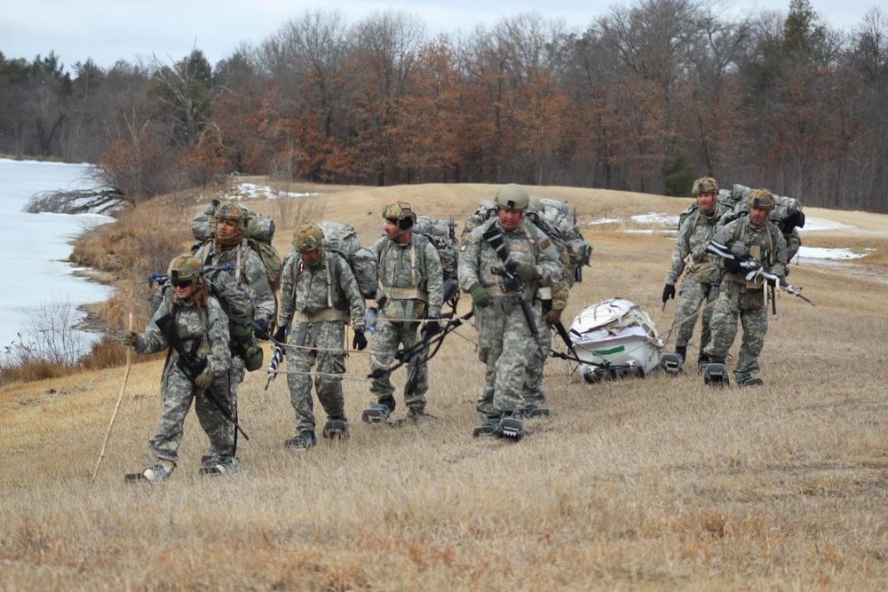 Fort McCoy Cold-Weather Operations Course students practice ahkio sled use