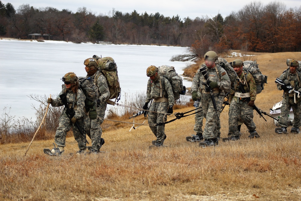 Fort McCoy Cold-Weather Operations Course students practice ahkio sled use