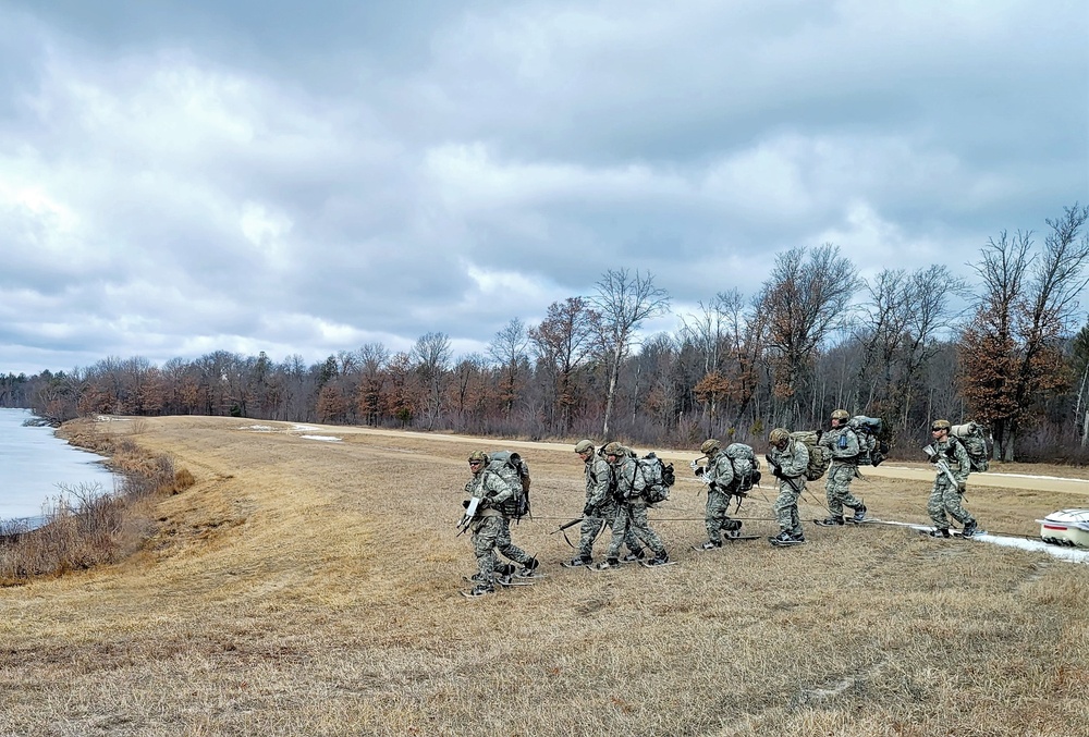 Fort McCoy Cold-Weather Operations Course students practice ahkio sled use