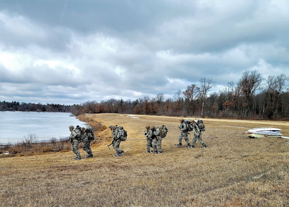 Fort McCoy Cold-Weather Operations Course students practice ahkio sled use