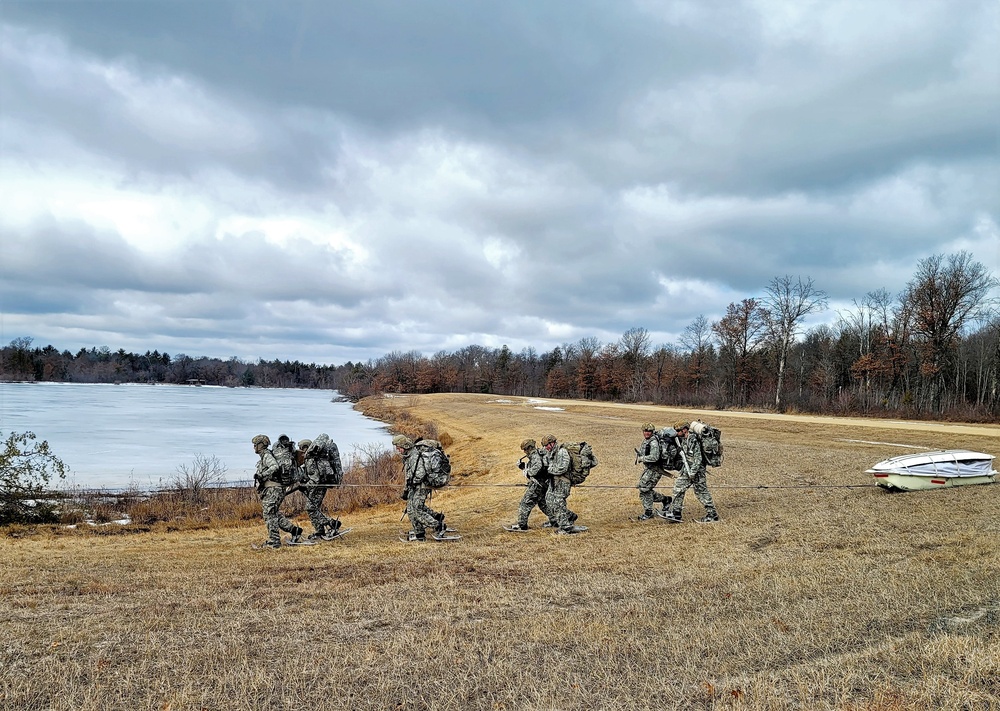 Fort McCoy Cold-Weather Operations Course students practice ahkio sled use