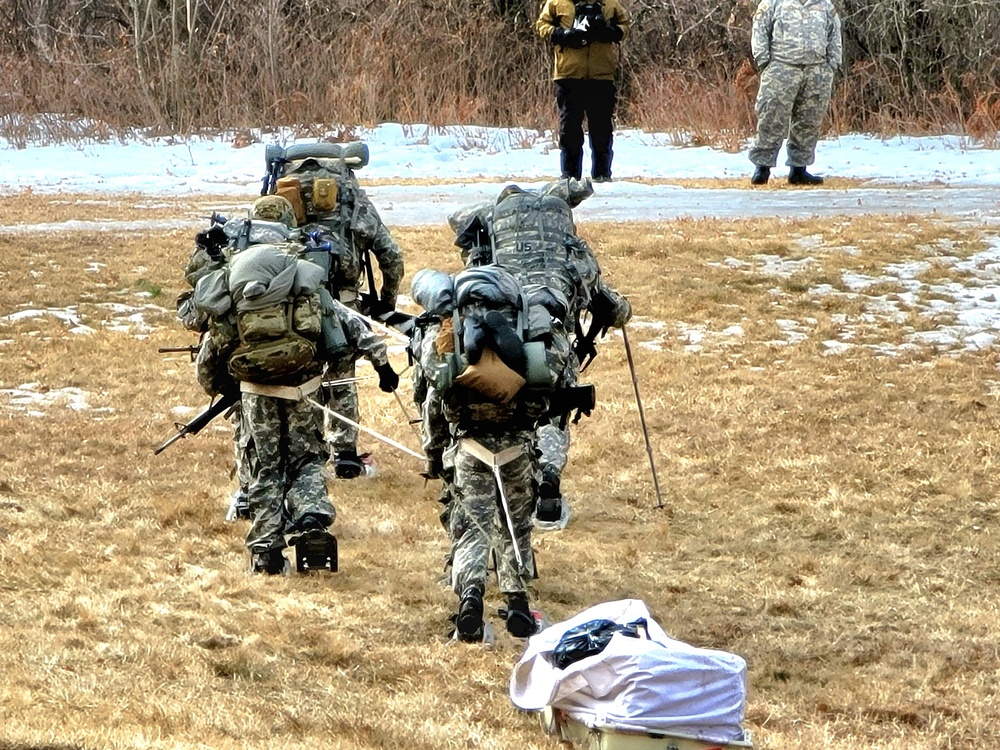 Fort McCoy Cold-Weather Operations Course students practice ahkio sled use