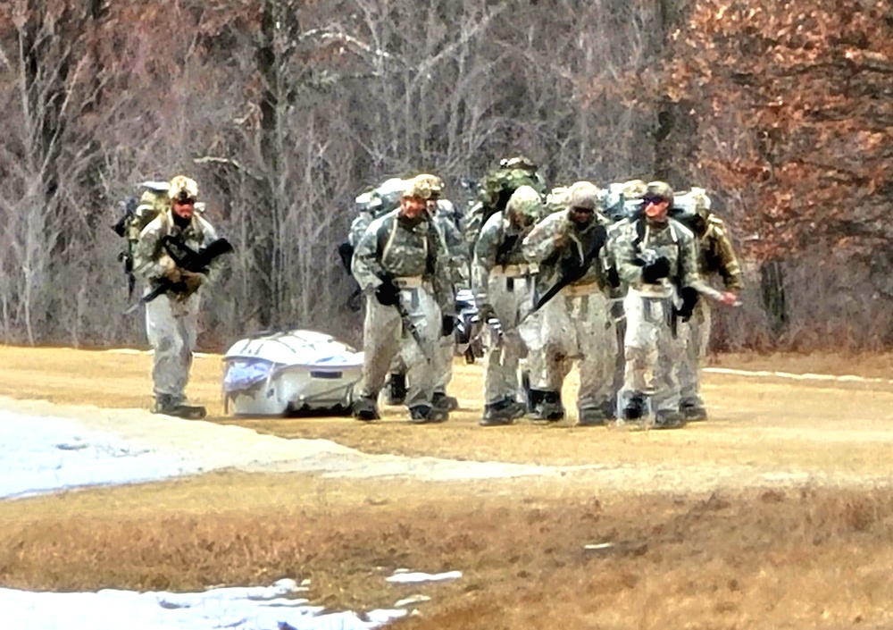 Fort McCoy Cold-Weather Operations Course students practice ahkio sled use