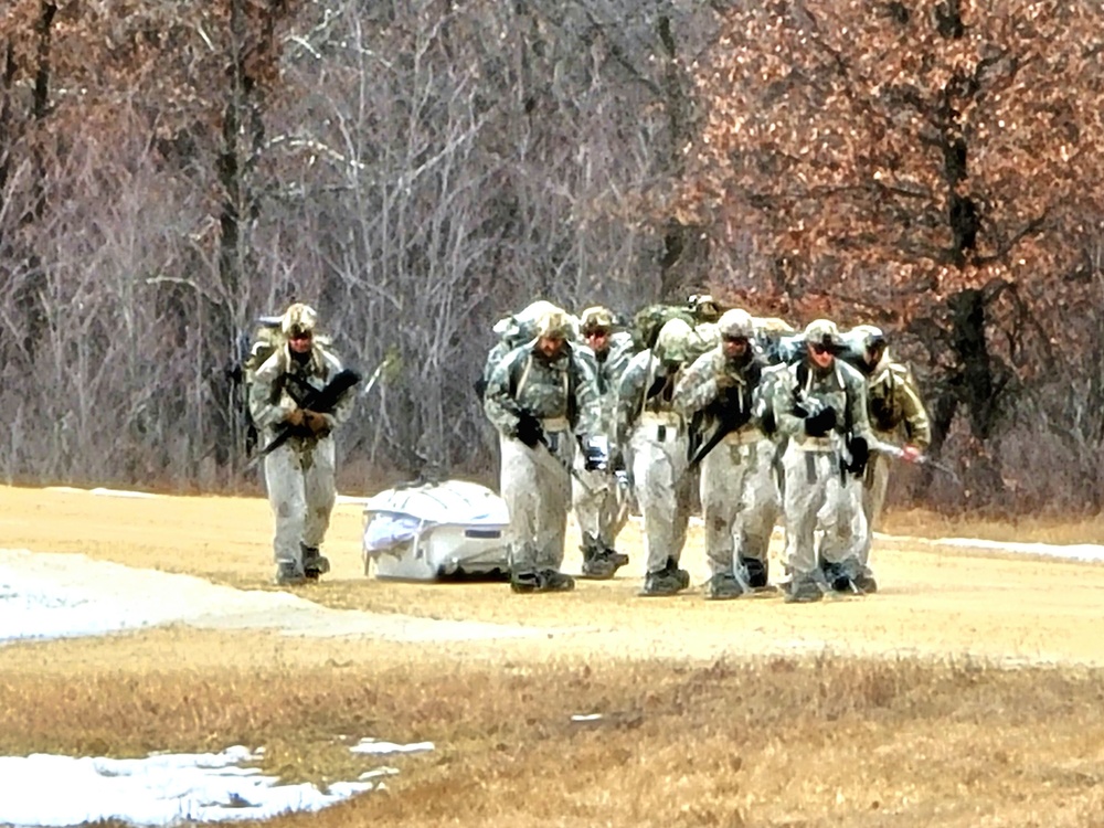 Fort McCoy Cold-Weather Operations Course students practice ahkio sled use