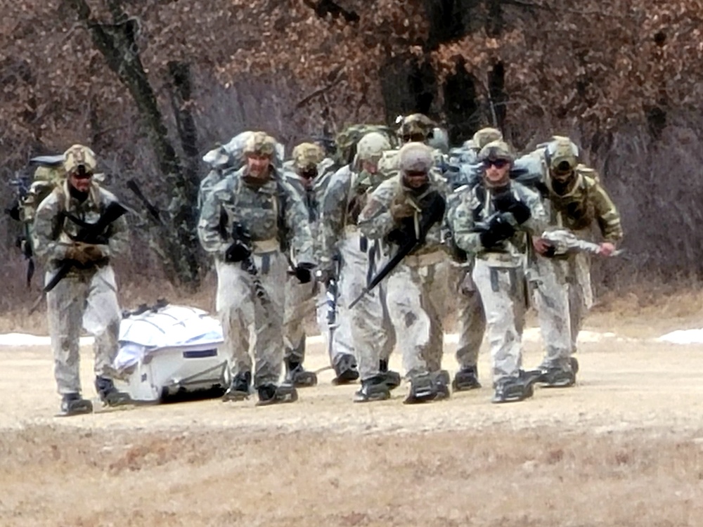 Fort McCoy Cold-Weather Operations Course students practice ahkio sled use