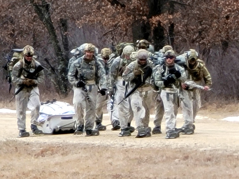 Fort McCoy Cold-Weather Operations Course students practice ahkio sled use