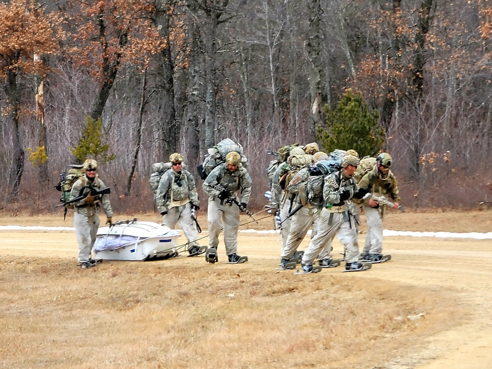 Fort McCoy Cold-Weather Operations Course students practice ahkio sled use