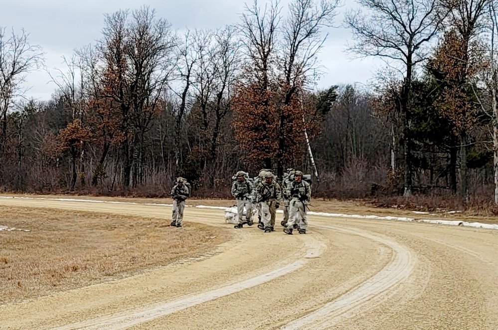 Fort McCoy Cold-Weather Operations Course students practice ahkio sled use