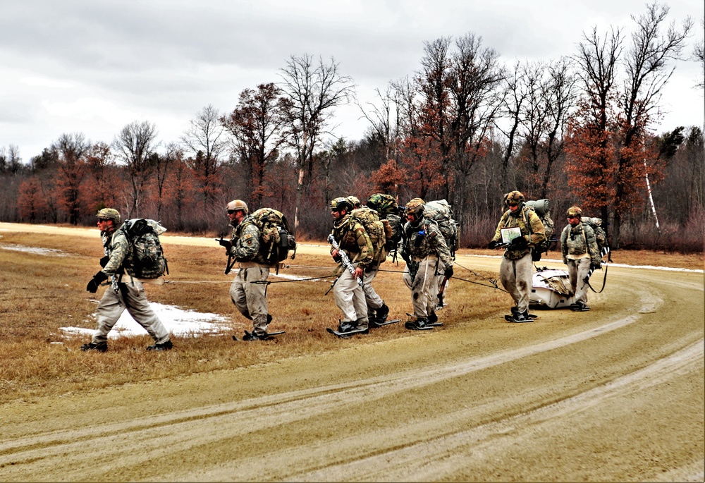 Fort McCoy Cold-Weather Operations Course students practice ahkio sled use