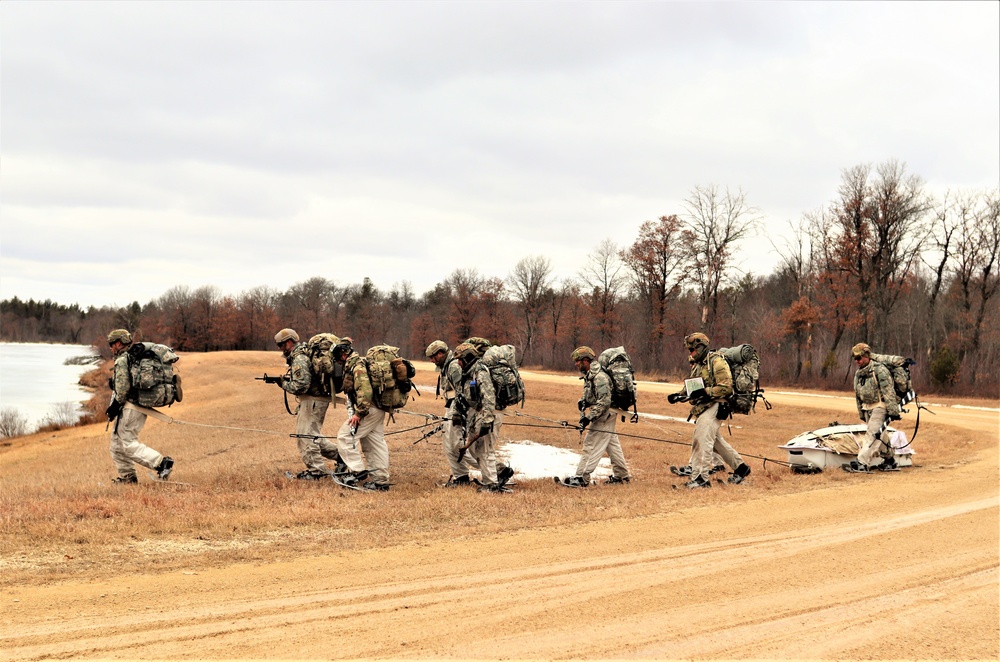 Fort McCoy Cold-Weather Operations Course students practice ahkio sled use