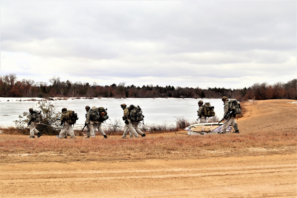 Fort McCoy Cold-Weather Operations Course students practice ahkio sled use