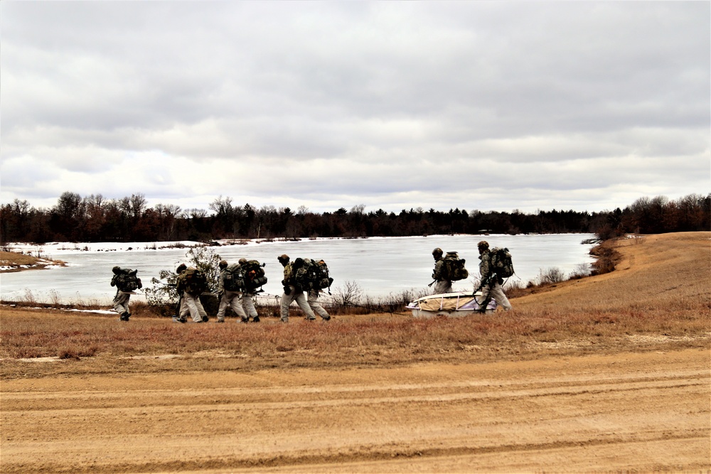 Fort McCoy Cold-Weather Operations Course students practice ahkio sled use