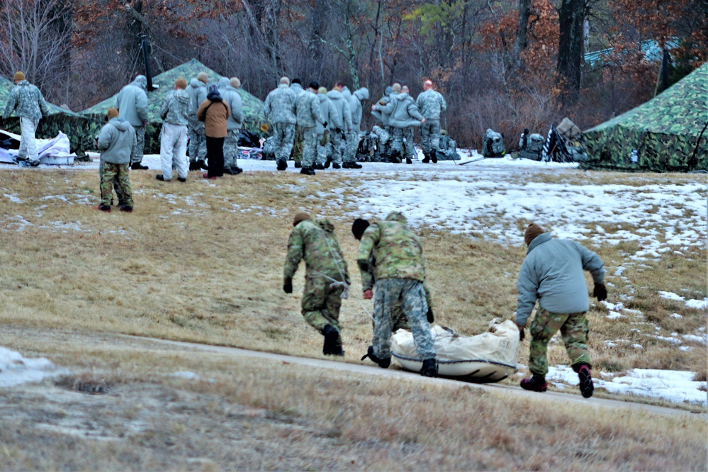 Fort McCoy Cold-Weather Operations Course students practice ahkio sled use