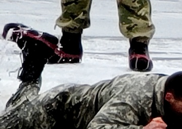 CWOC class 22-05 students jump in for cold-water immersion training at Fort McCoy
