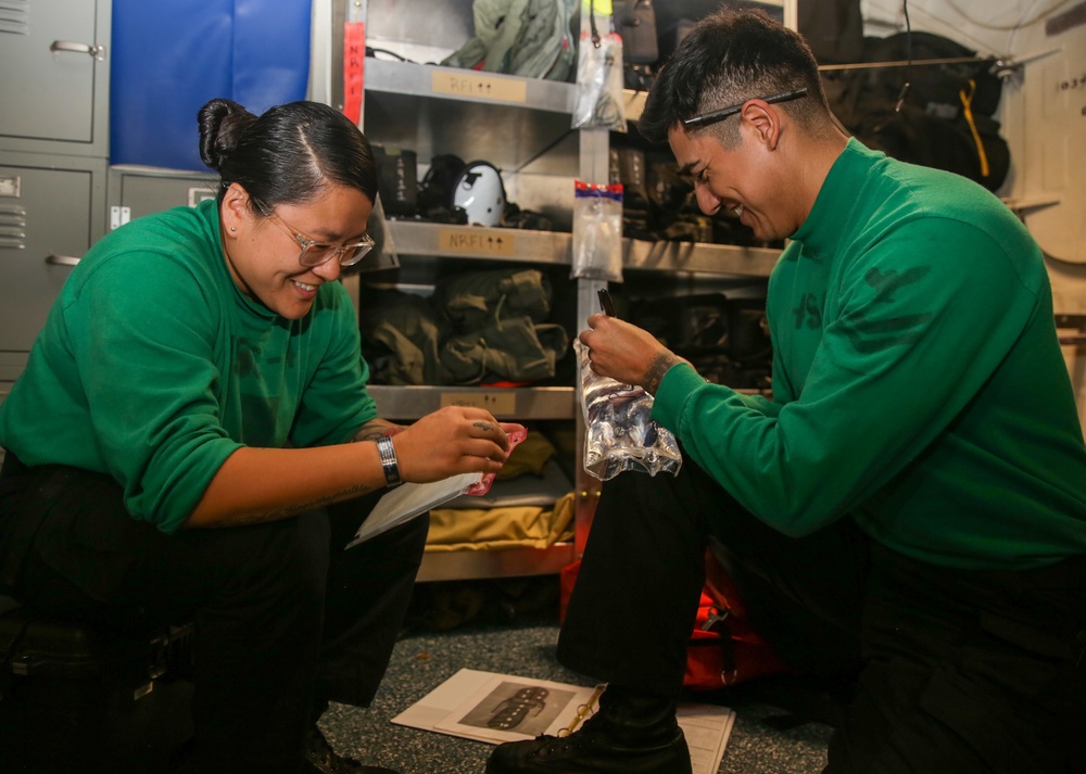 Abraham Lincoln Sailors conduct maintenance