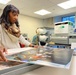 DLA Document Services Team Prepares White House Photos for Framing