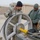 Personnel from the 212th Air National Guard, Milford, MA., 202nd Engineering and Installation Squadron (EIS), Macon, GA, 285th EIS, Biloxi, MS and the 215 EIS, Everett, WA. join forces at Bagram Airfield, Afghanistan to install fiber optic cable