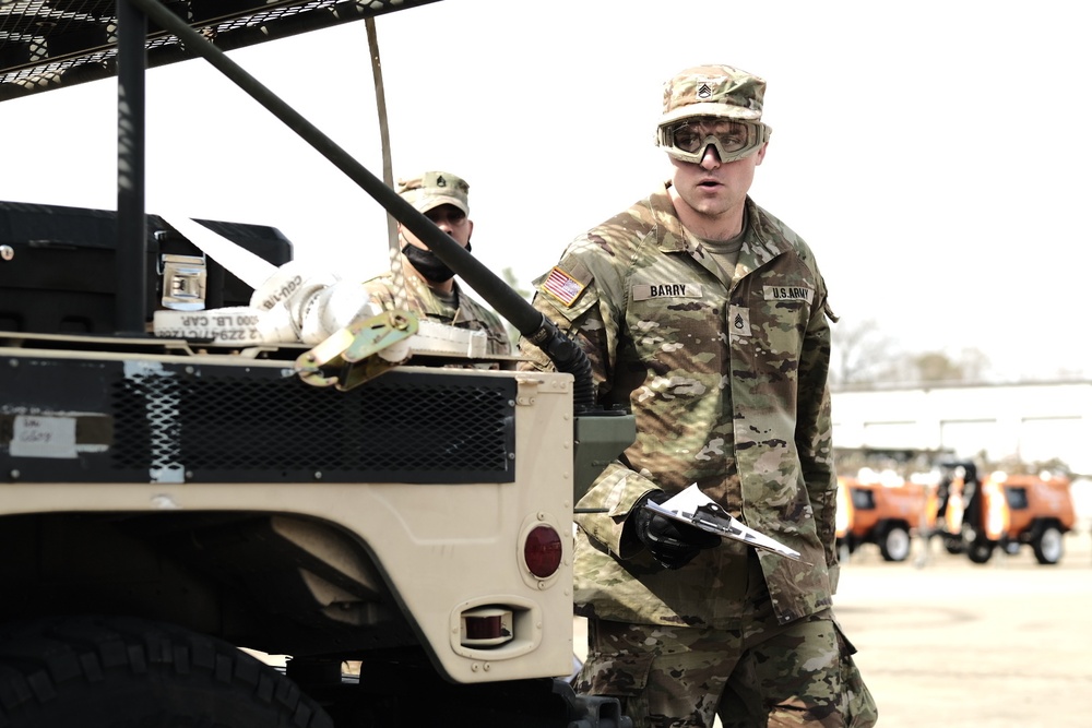 Five Transportation Soldiers endure a jam-packed day of Army challenges during Noncommissioned Officer and Soldier of the Quarter competition