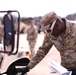 Transportation Soldiers conduct preventive maintenance checks,services during Soldier of the Quarter competition