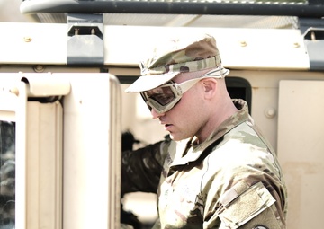 Transportation Soldiers conduct preventive maintenance checks,services during Soldier of the Quarter competition