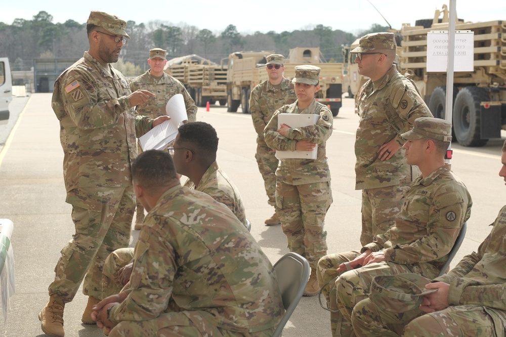 Soldiers conduct preventive maintenance checks and services during competition
