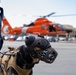 Coast Guard K-9s and their handlers perform K-9 hoisting operations