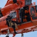 Coast Guard K-9s and their handlers perform K-9 hoisting operations