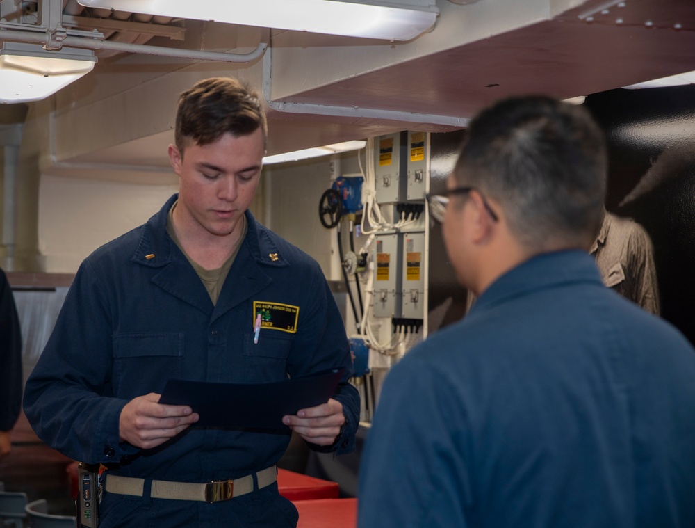 A Sailor Re-Enlists Aboard USS Ralph Johnson (DDG 114)